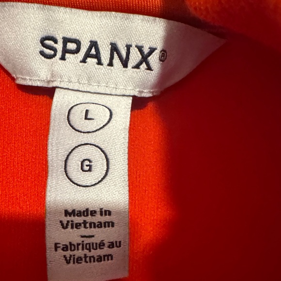 SPANX Exclusive: Poppy Color AirEssentials® Pique Sleeveless Mockneck (L) - Picture 5 of 10